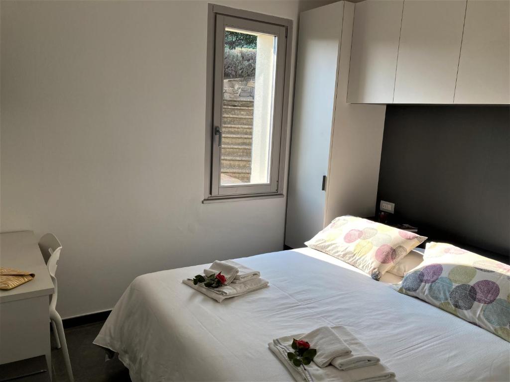 Posteľ alebo postele v izbe v ubytovaní Residence Il Bosso