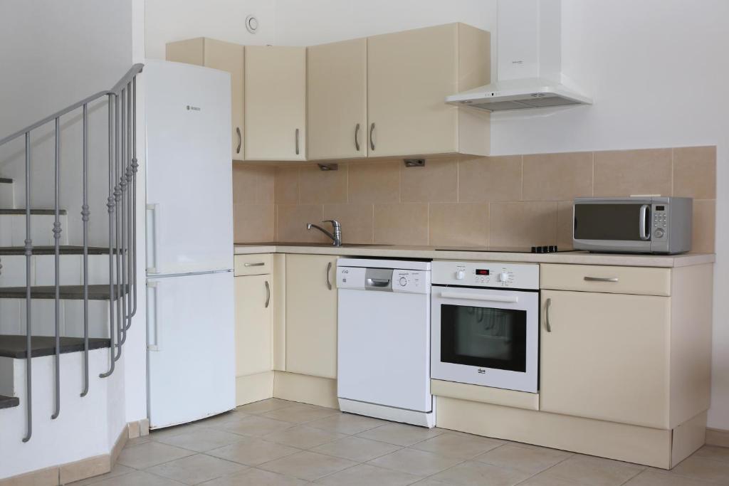 Kuchyň nebo kuchyňský kout v ubytování Casa Mia