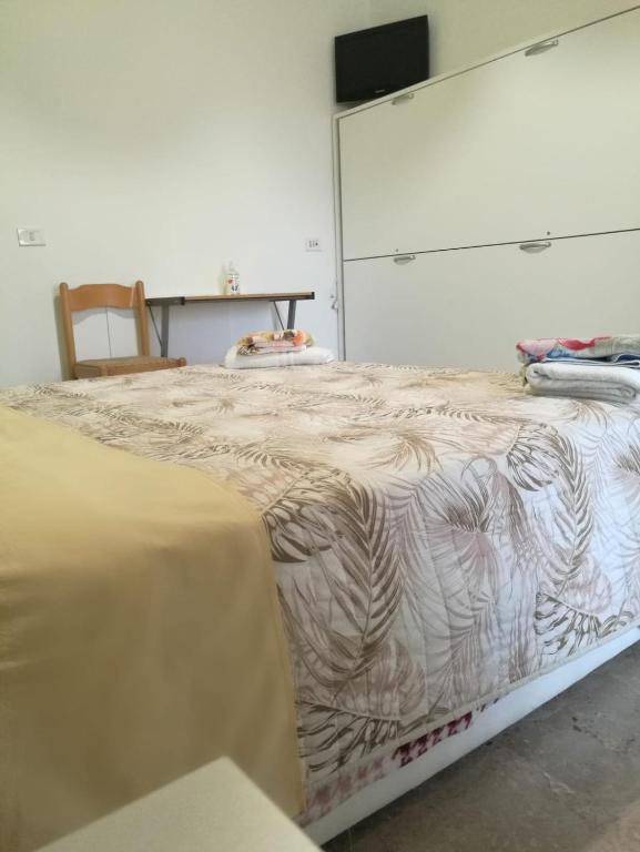 Postel nebo postele na pokoji v ubytování Le Magnolie B&B