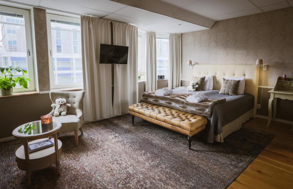 Postel nebo postele na pokoji v ubytování Freys Hotel