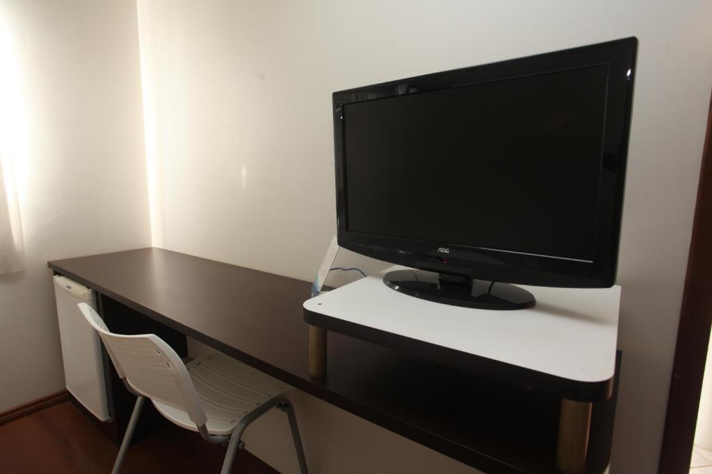 TV a/nebo společenská místnost v ubytování Hotel Plaza Cascavel