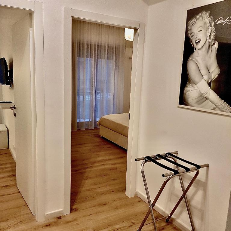 Televízia a/alebo spoločenská miestnosť v ubytovaní Residence D'azeglio