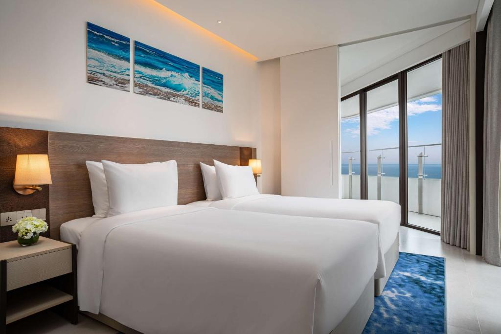 Postel nebo postele na pokoji v ubytování Radisson Hotel Danang