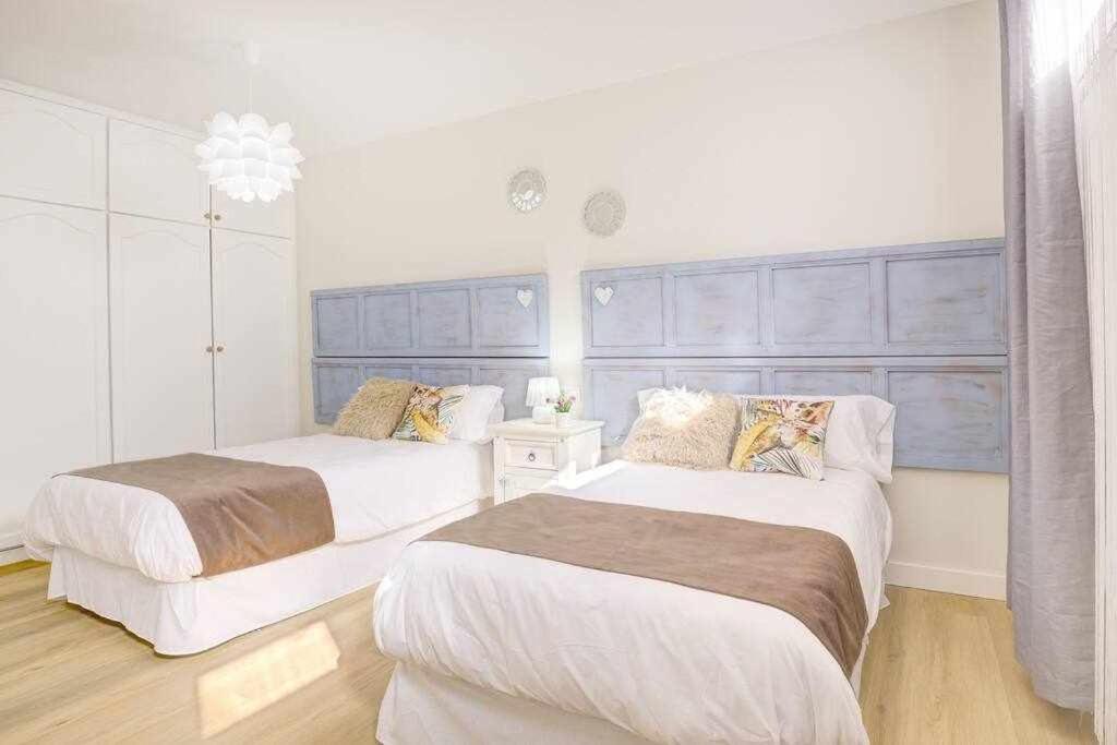 Posteľ alebo postele v izbe v ubytovaní La Favorita preciosa villa con piscina privada