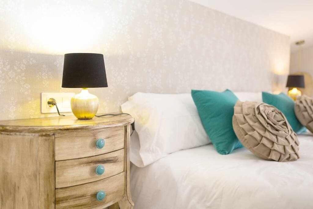 Posteľ alebo postele v izbe v ubytovaní La Favorita preciosa villa con piscina privada