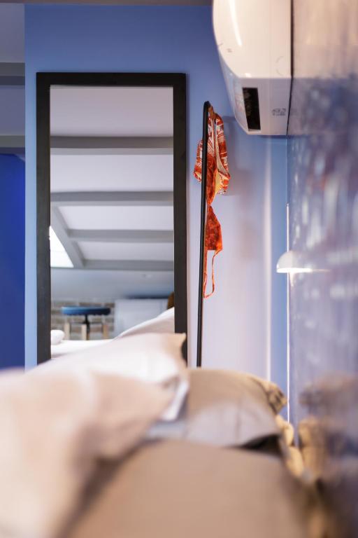 Postel nebo postele na pokoji v ubytování Vailato Loft Suites