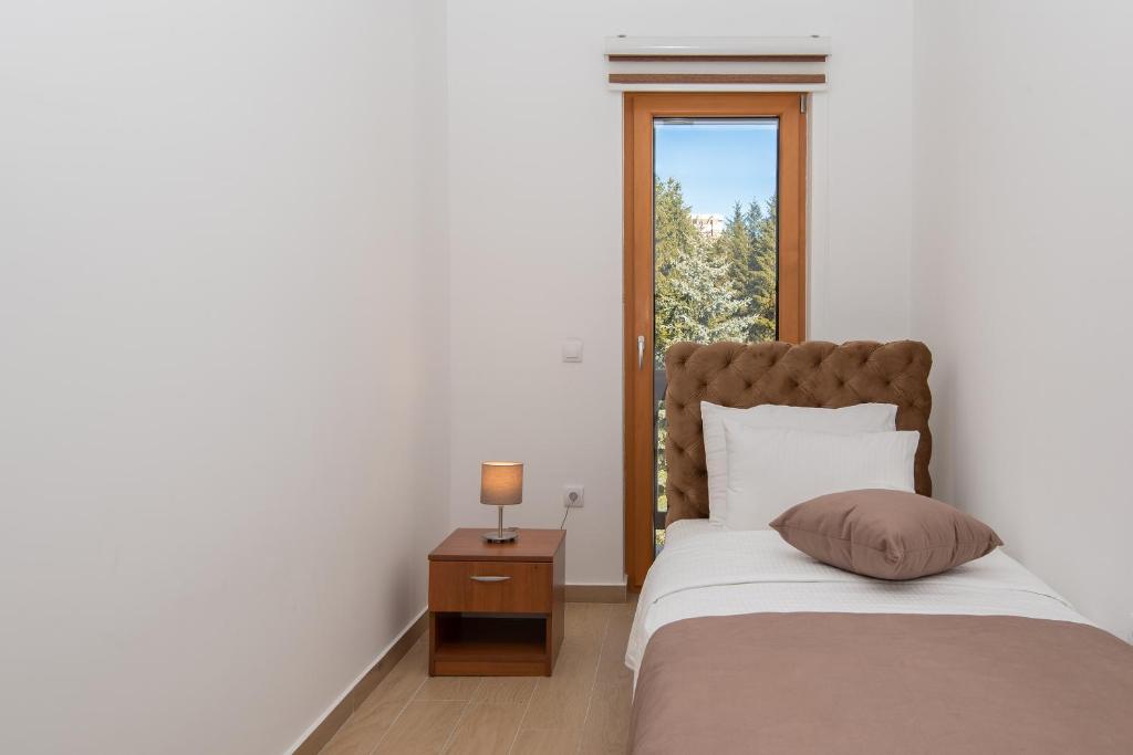Krevet ili kreveti u jedinici u okviru objekta Hotel Agape