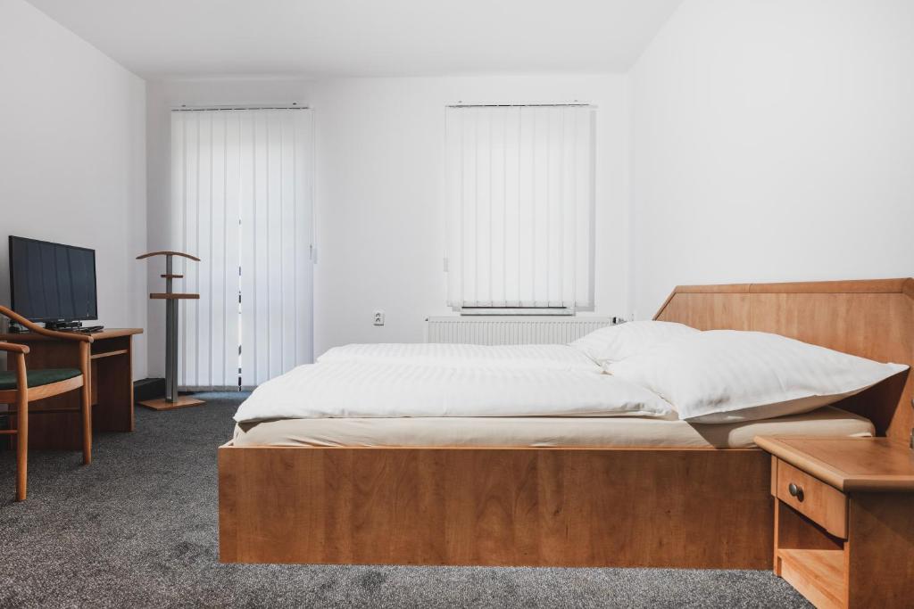 Postel nebo postele na pokoji v ubytování Colatransport