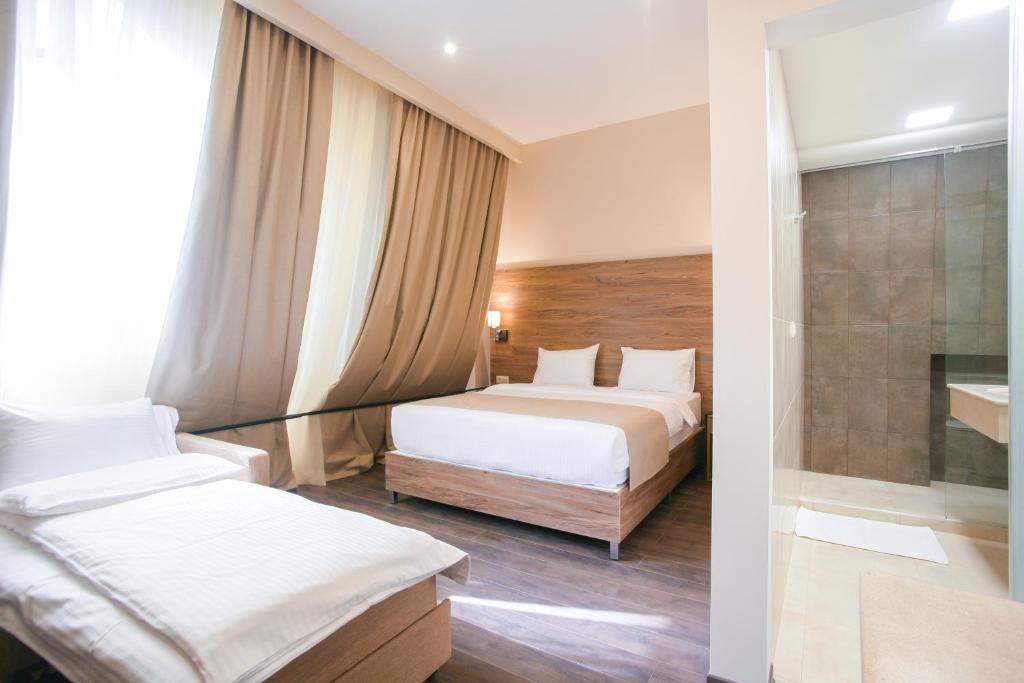 Postel nebo postele na pokoji v ubytování Nacho Hotel Yerevan