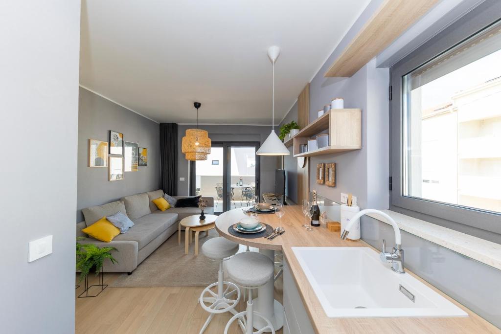 Kuchyňa alebo kuchynka v ubytovaní Apartman 4U