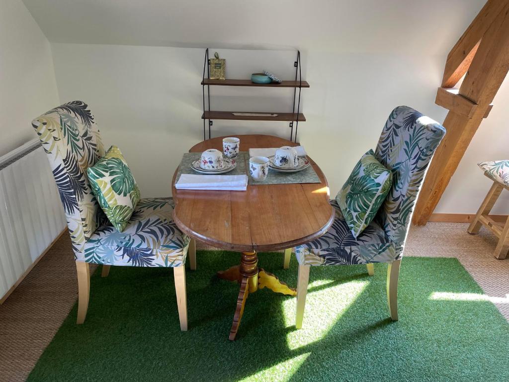 Posezení v ubytování Aux murmures de la nature B&B