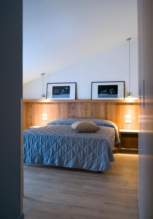 Postel nebo postele na pokoji v ubytování Hotel Oliva