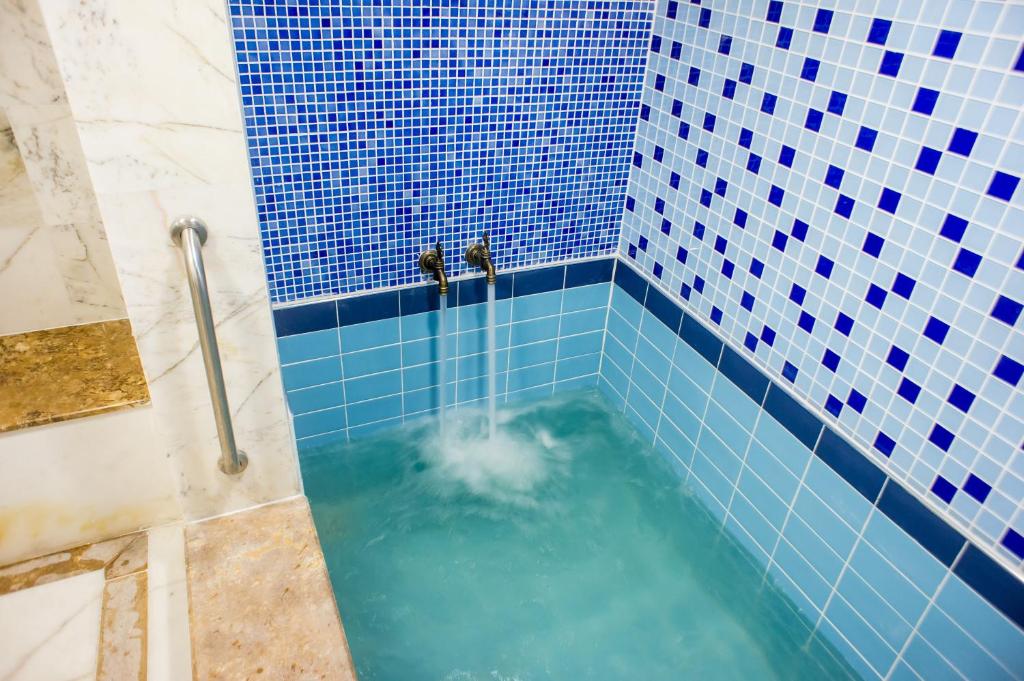 Koupelna v ubytování Aforia Thermal Residences