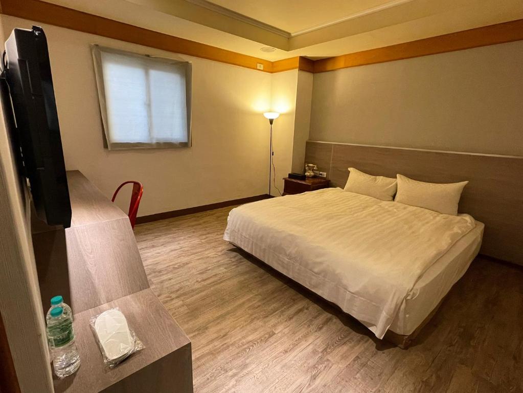 Postel nebo postele na pokoji v ubytování The Rivero Hotel