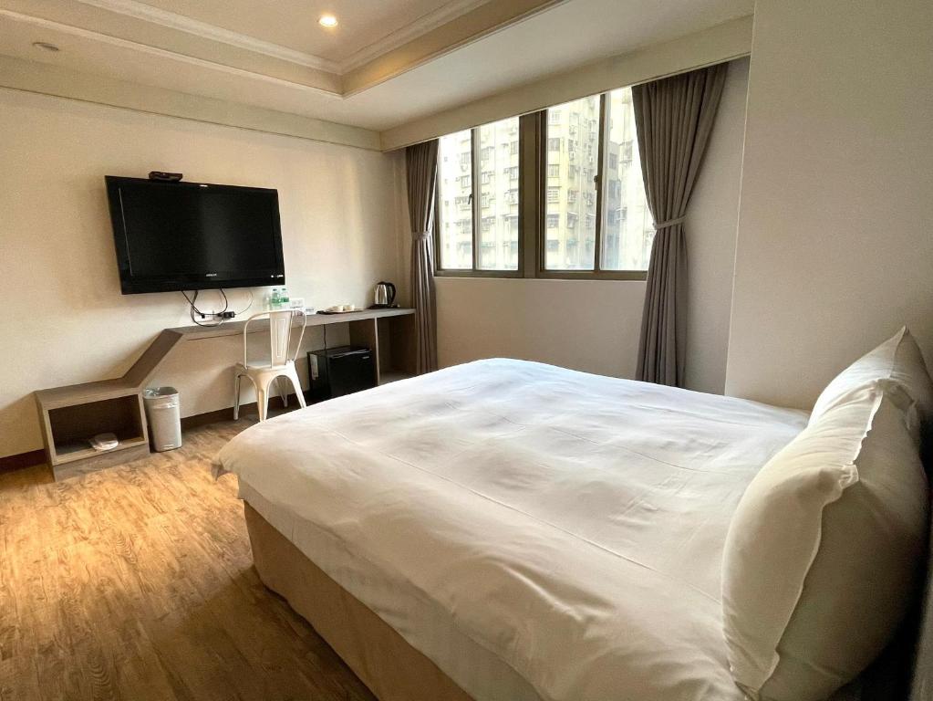 TV a/nebo společenská místnost v ubytování The Rivero Hotel