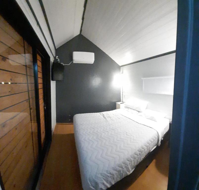 Letto o letti in una camera di Cantal Tiny house