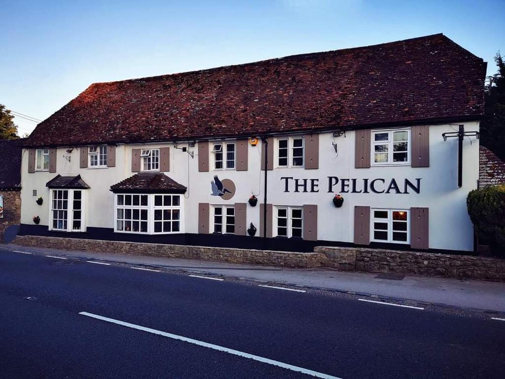 a building on the side of a street at The Pelican Inn in Stapleford