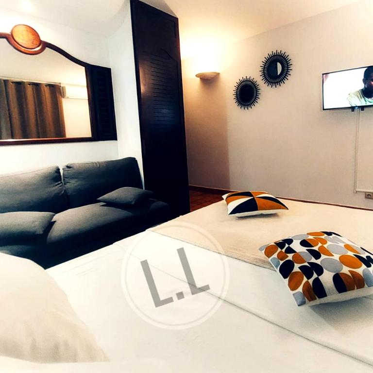 Postel nebo postele na pokoji v ubytování LittleLovely Studio
