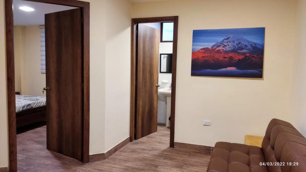 Postel nebo postele na pokoji v ubytování Apart Cayambe