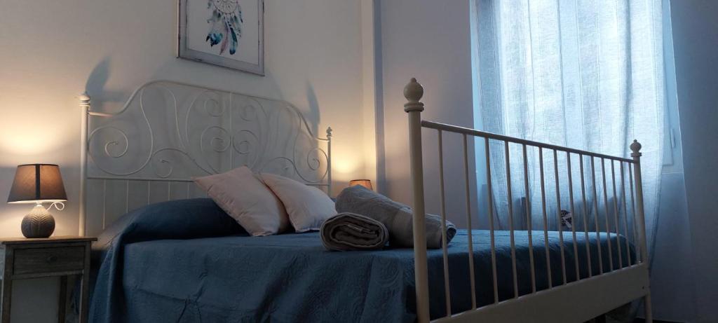 Postel nebo postele na pokoji v ubytování Pippo a Vernazza Rooms