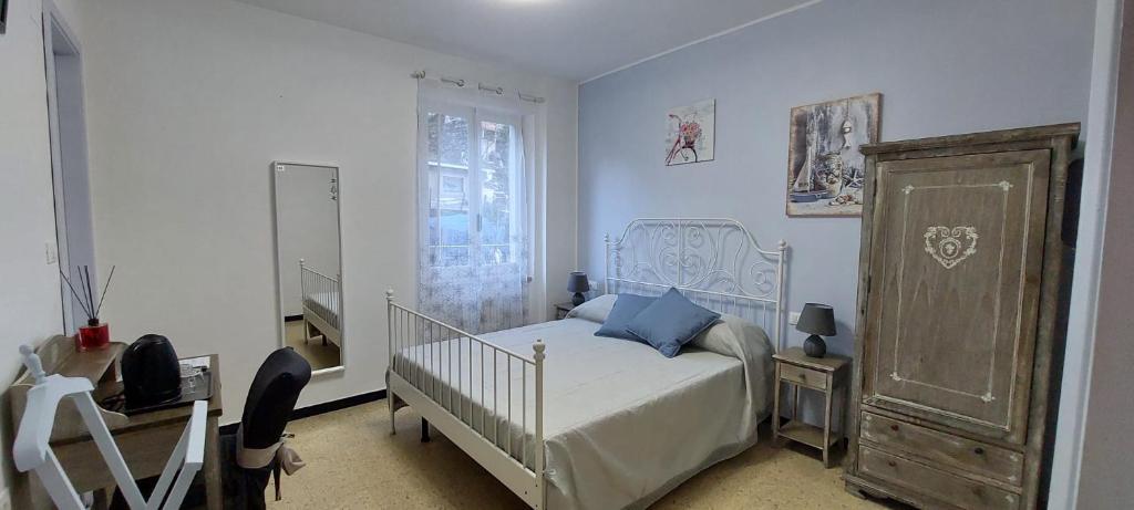 Postel nebo postele na pokoji v ubytování Pippo a Vernazza Rooms