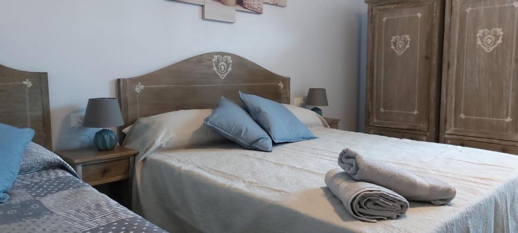 Postel nebo postele na pokoji v ubytování Pippo a Vernazza Rooms