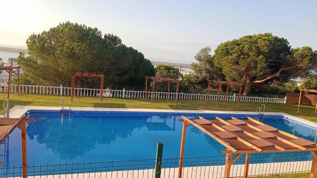 Gallery image of APARTAMENTO EN ROMPIDO con piscina, chiringuito y pistas in Huelva
