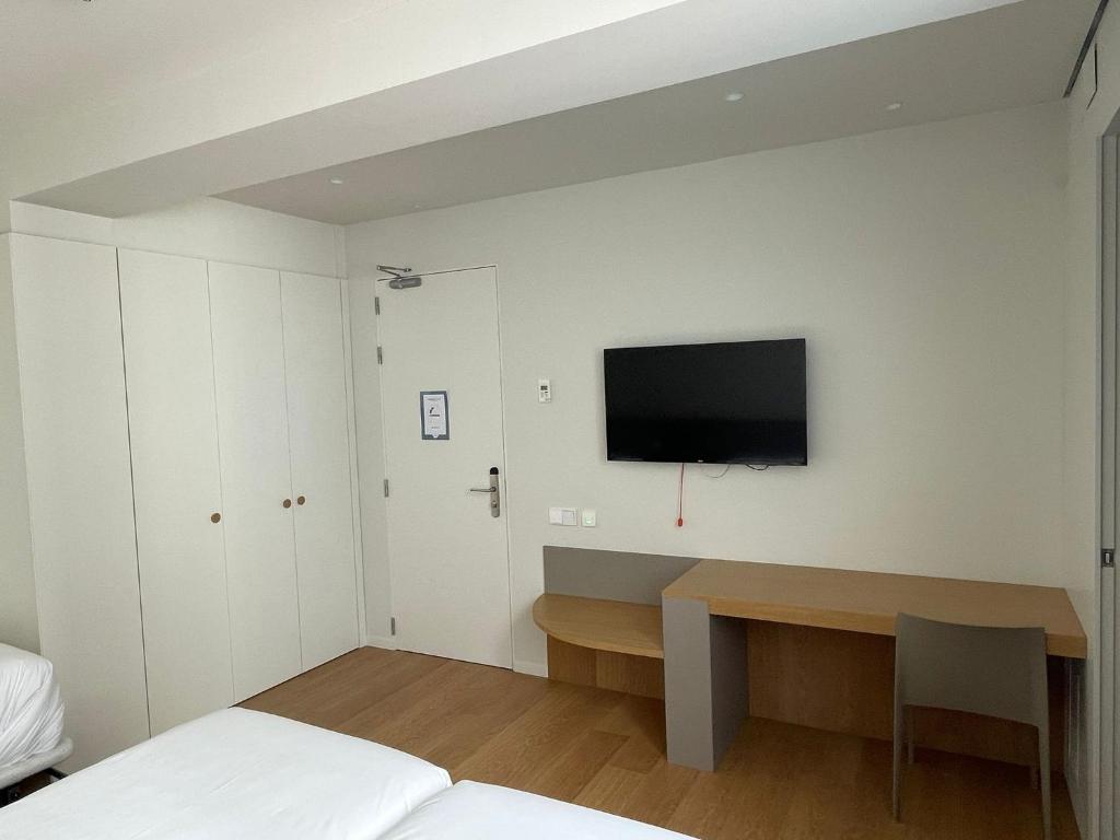 TV a/nebo společenská místnost v ubytování Teide Rooms