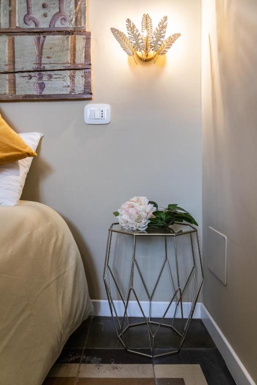 Posteľ alebo postele v izbe v ubytovaní TRESCA CHARME luxury Rooms