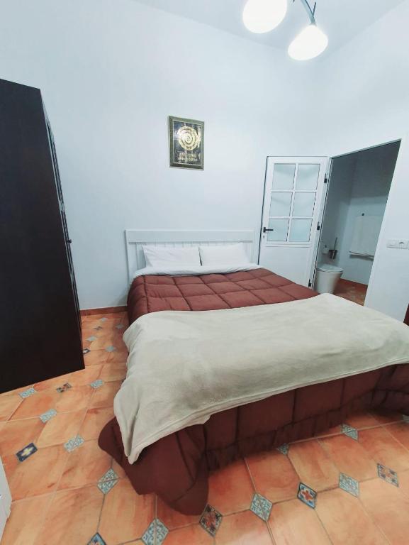 Łóżko lub łóżka w pokoju w obiekcie Vista Tunte, Camino de Santiago