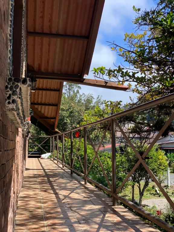 Balkón nebo terasa v ubytování Stone Cabins Boquete