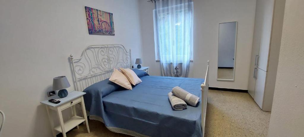 Postel nebo postele na pokoji v ubytování Pippo a Vernazza Rooms