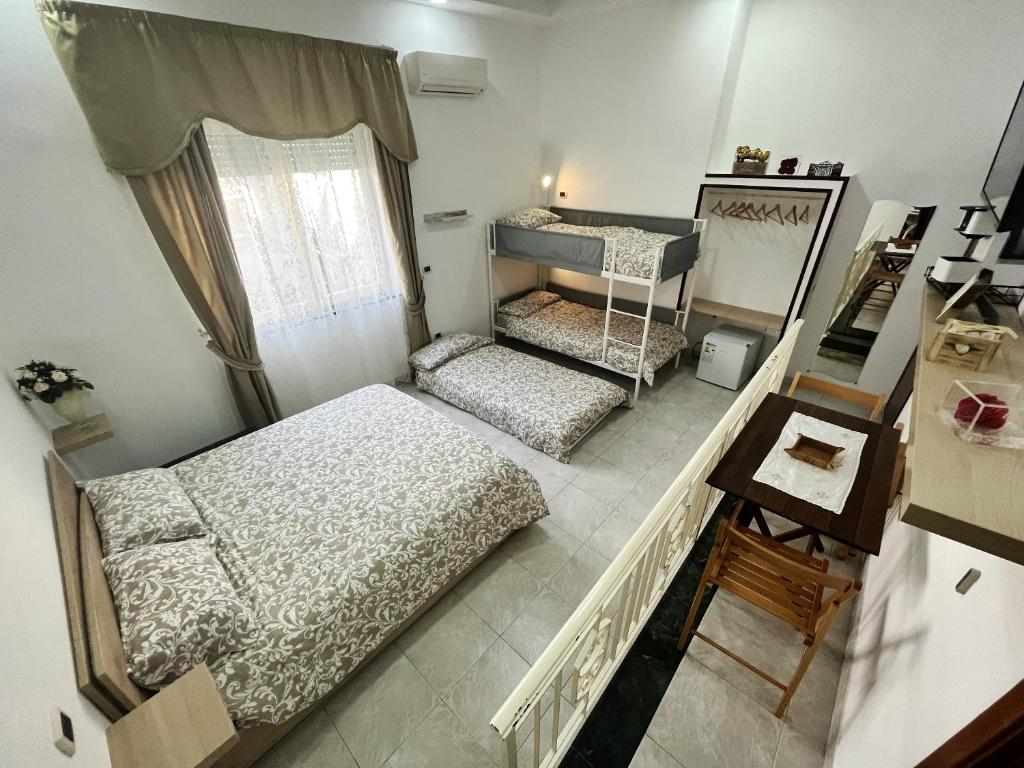 Ένα ή περισσότερα κρεβάτια σε δωμάτιο στο Modern Apartment in Napoli, Balcony