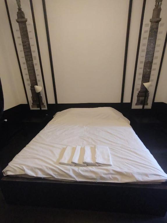 Postel nebo postele na pokoji v ubytování B96 suites