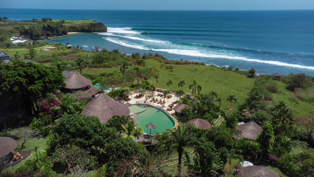 an aerial view of a resort and the ocean at La Joya Balangan Resort in Jimbaran