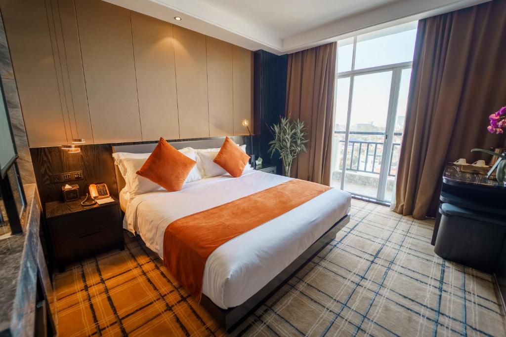 Postel nebo postele na pokoji v ubytování OCEAN HOTEL