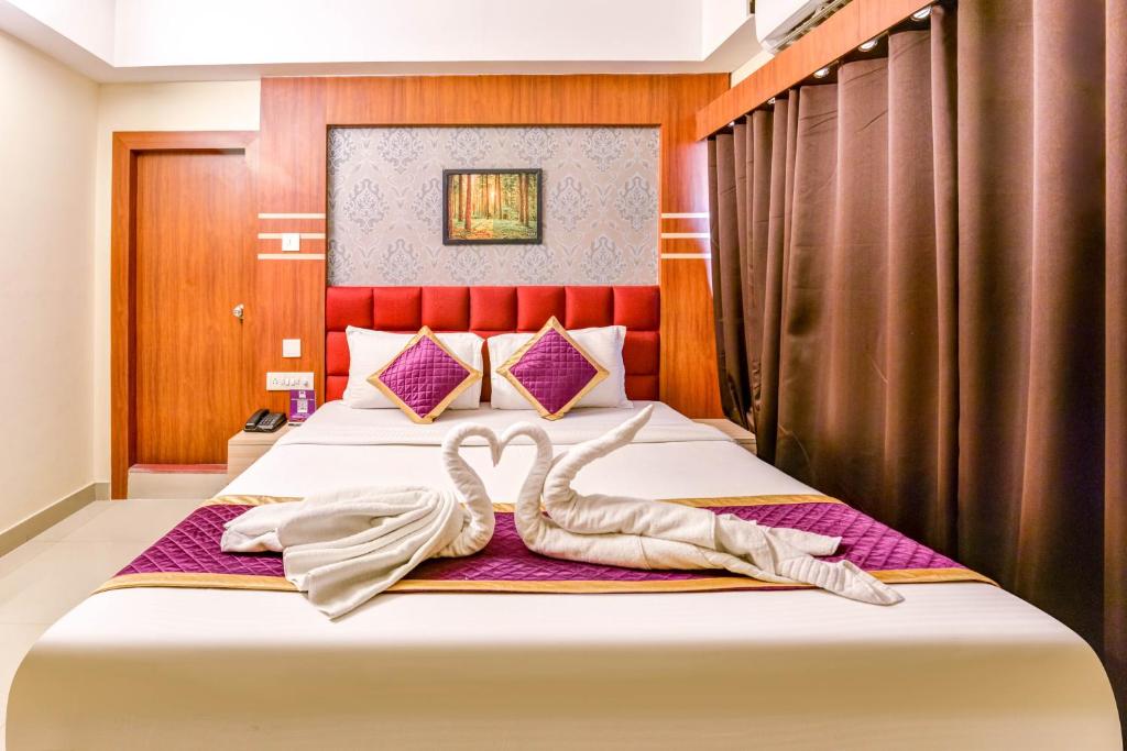 Postel nebo postele na pokoji v ubytování Mount Amara Hotel & Spa, Siliguri