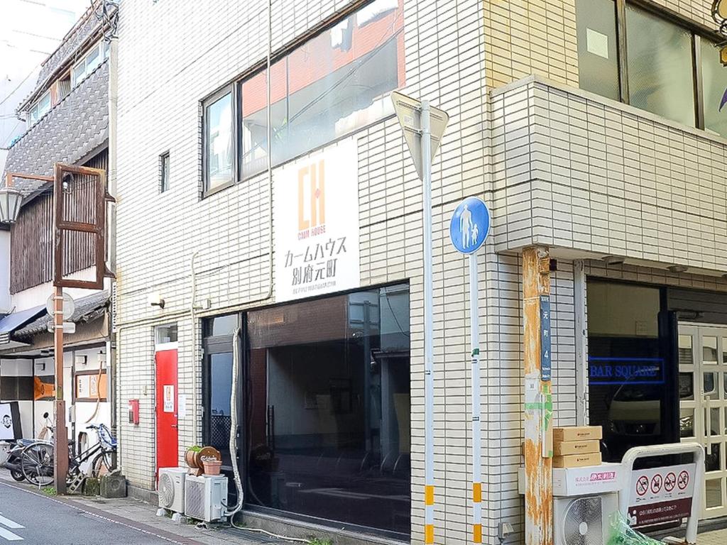 a store front of a building on a city street at Calm house Beppumotomachi in Beppu