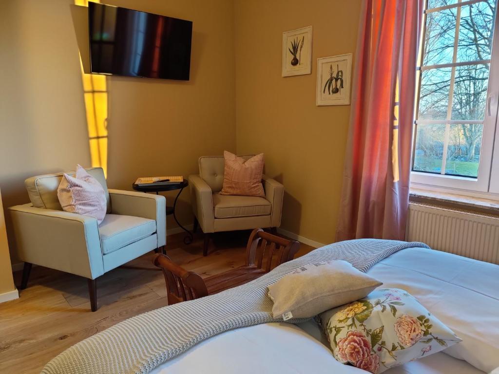 Postel nebo postele na pokoji v ubytování Golf- & Landhotel am alten Deich