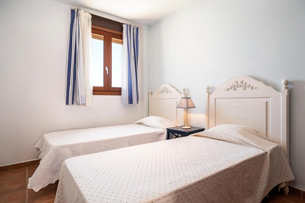 Posteľ alebo postele v izbe v ubytovaní Casa Poniente en playa Fuente del Gallo