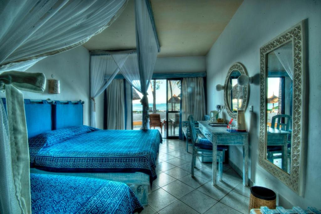Postel nebo postele na pokoji v ubytování Turtle Bay Beach Club- All Inclusive