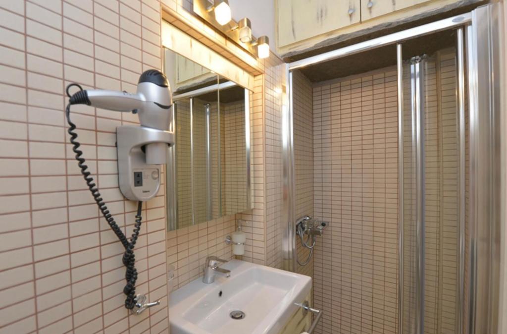 Koupelna v ubytování Anthousa Hotel