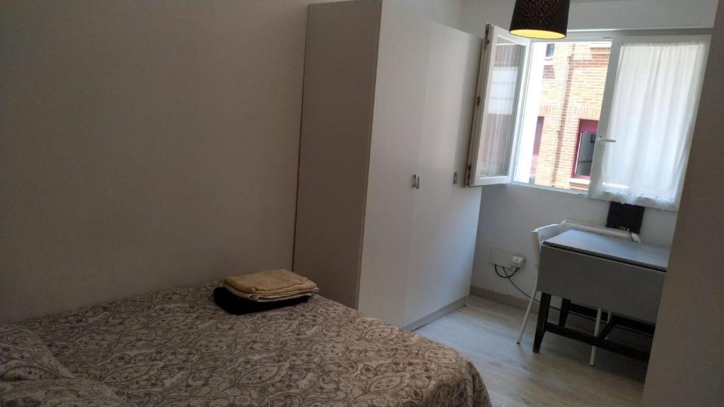 A bed or beds in a room at patio soleado DOS BAÑOS