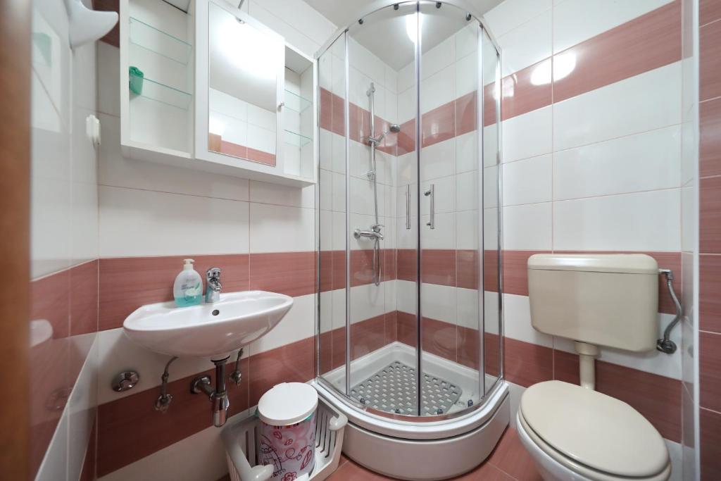 Kúpeľňa v ubytovaní Apartment Simeone