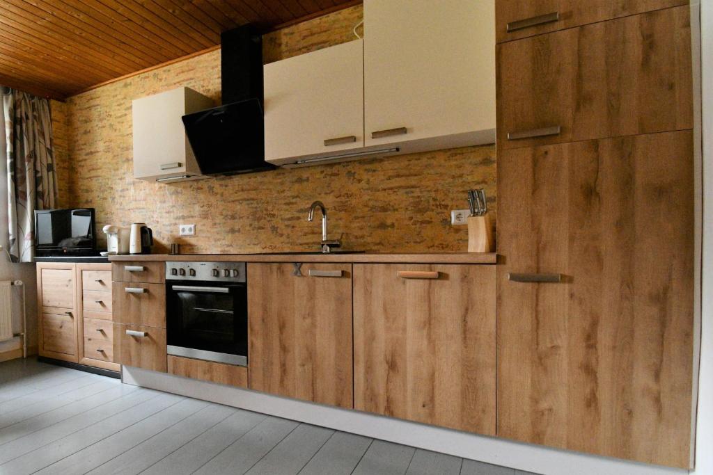 Kuchyňa alebo kuchynka v ubytovaní Das kleine Paradies