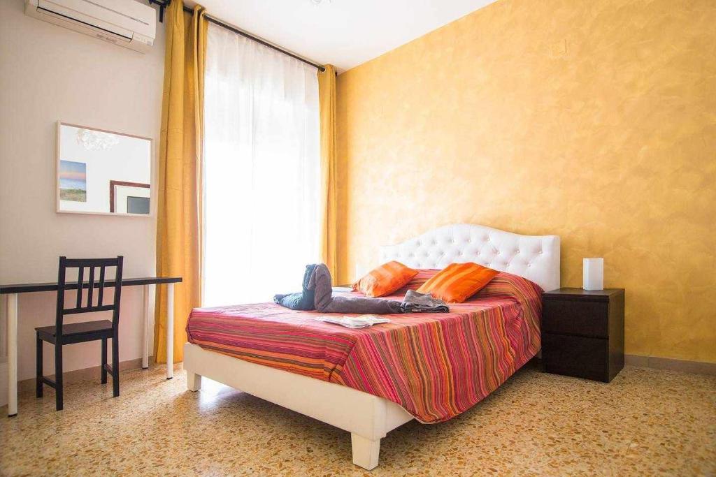 Posteľ alebo postele v izbe v ubytovaní Residenza Franca Vista panoramica