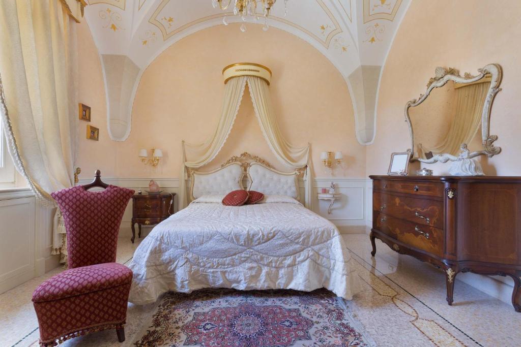 Łóżko lub łóżka w pokoju w obiekcie Villa Nicrys by Perle di Puglia
