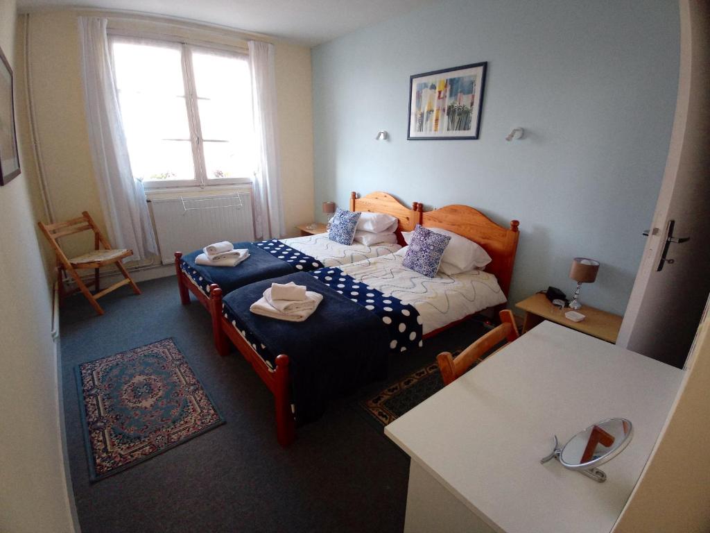 Postel nebo postele na pokoji v ubytování Lenard Charles Bed & Breakfast