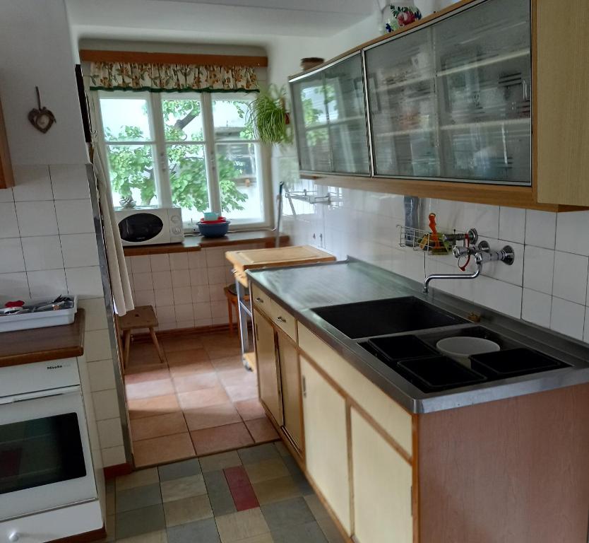 Kuchyň nebo kuchyňský kout v ubytování Gross Lettenwag