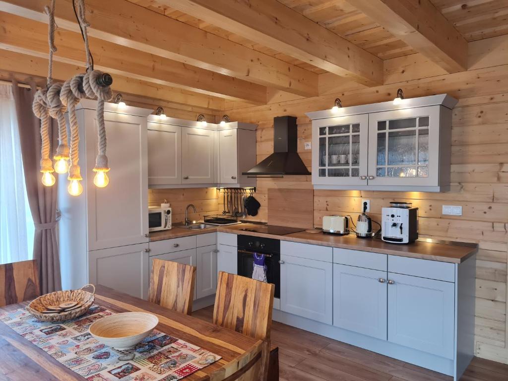 Kuchyň nebo kuchyňský kout v ubytování Panorama Tatry Chalets